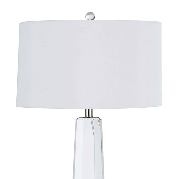 White linen shade of a crystal lamp